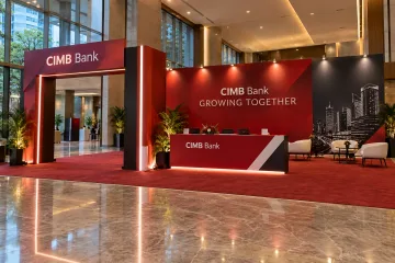 CIMB Bank sme business networking with a branded registration counter, simple walk-through welcome portal and a clean business forum media wall
