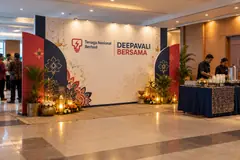 Tenaga Nasional Berhad corporate deepavali celebration design reference with corporate deepavali reception wall and staff hospitality counter