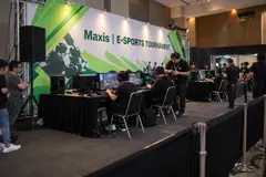 Maxis e-sports tournament design reference with pc tournament desks and spectator seating