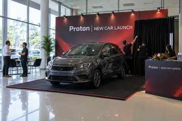 Proton new car launch design reference with showroom car reveal stage