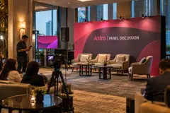 Astro panel discussion design reference with media conversation lounge and recording position