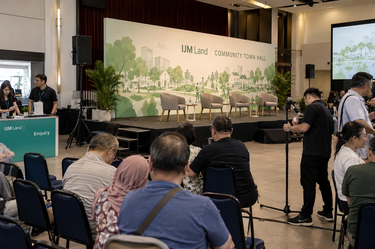 IJM Land public town hall design reference with resident public-dialogue stage and audience microphone