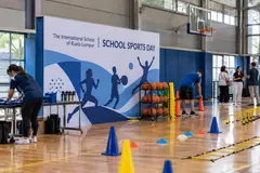 The International School of Kuala Lumpur school sports day design reference with school sports-hall activity and photo station